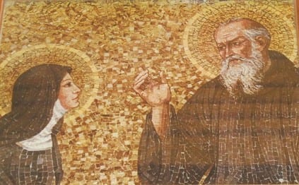Gold mosaic depicting two haloed figures, a woman in a white veil and a bearded man in a dark habit, facing each other.